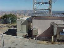 Sound attenuated, unmanned, remote mountain top generator module supporting a telecommunications repeater hut- all designed, built, and installed by North American Power & Controls. Inc