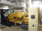 Sound attenuated 1000 kW Caterpillar standby-emergency diesel generator engine room. Northern California telecommunications installation.