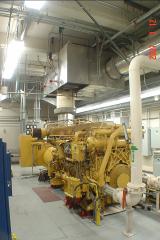 2000 kW Caterpillar 3516TA emergency standby diesel generator with Catalytic Converter- Particulate Filter assembly- converter is equipped with pre-heaters.